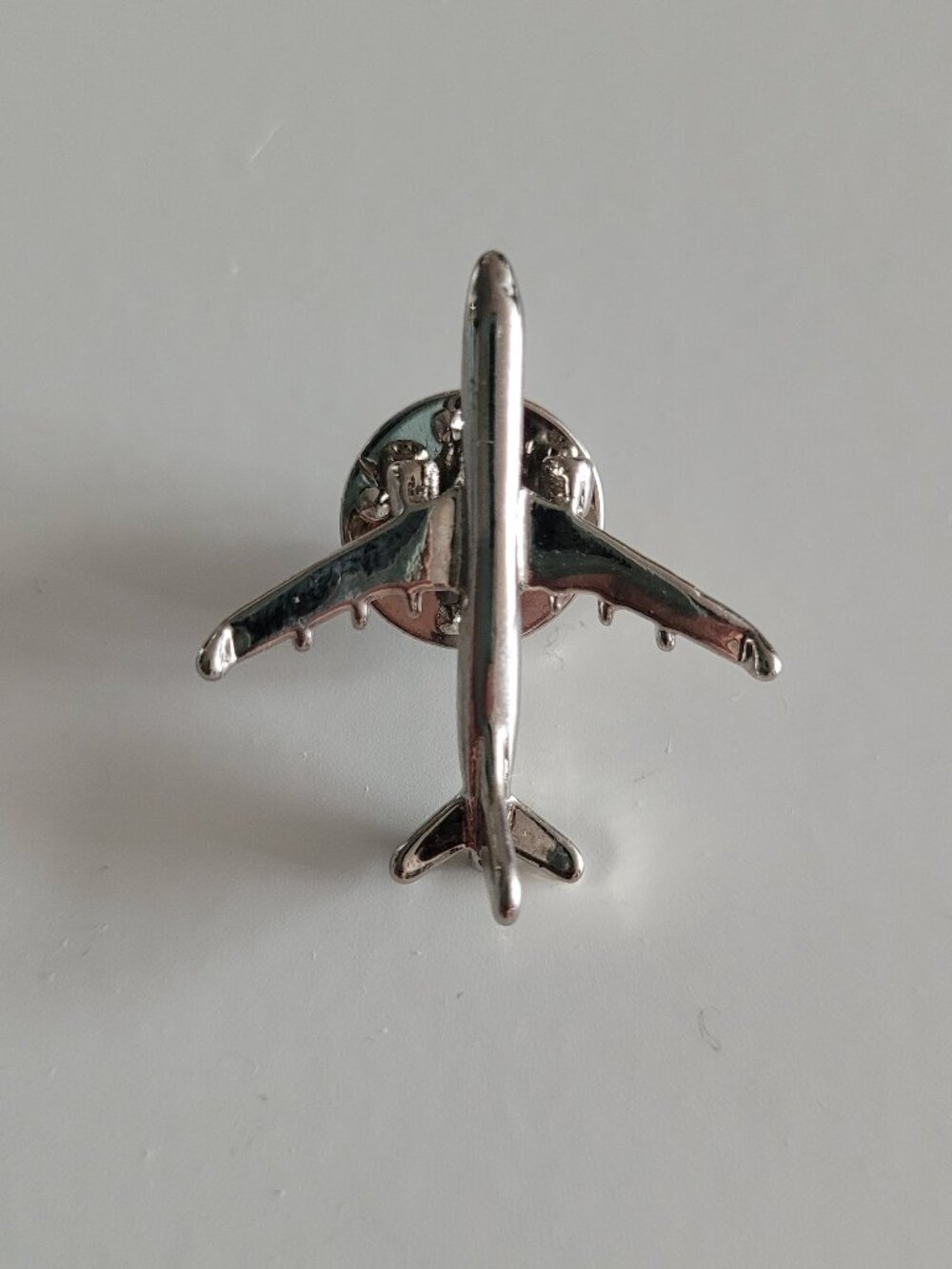Silver-toned Airplane Pin